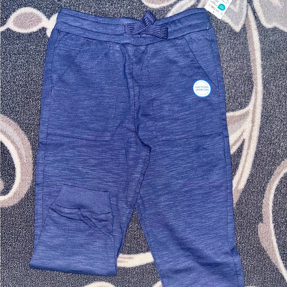 Comfy cotton joggers with drawstring waist and elastic ankles.